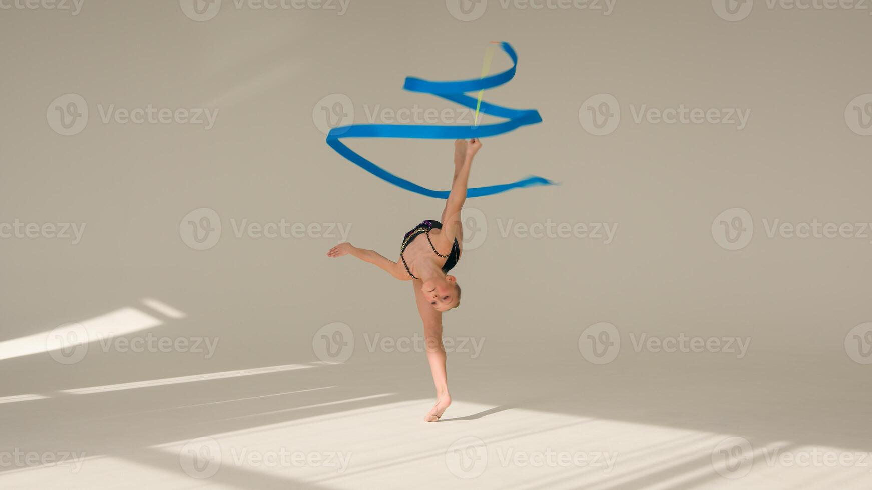 Caucasian woman schoolgirl kid daughter child little girl artistic female ballet dancer sportswoman young athlete teenager gymnast spinning dancing with tape sport gymnastics dance studio choreography photo