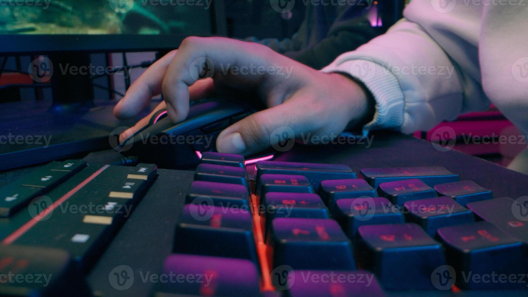 Frustrated Caucasian blogger male guy modern cyber sport host influencer addict man touch keyboard streamer lose game vlogger playing gaming computer at home upset gamer defeat difficulty neon stream photo