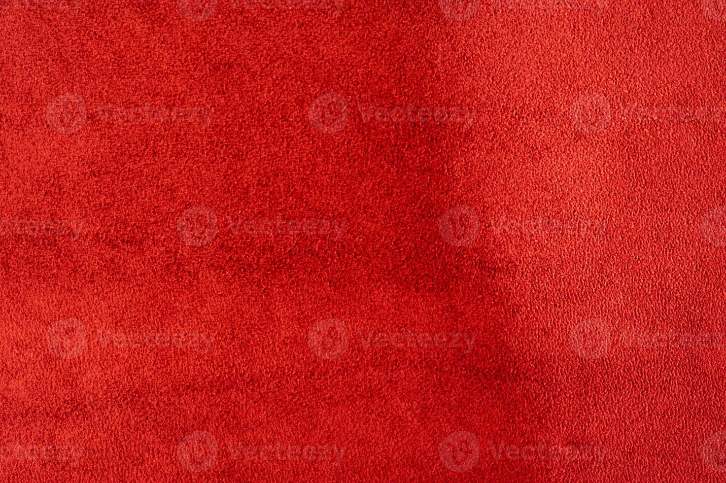 Natural red suede leather as a macro photo background.