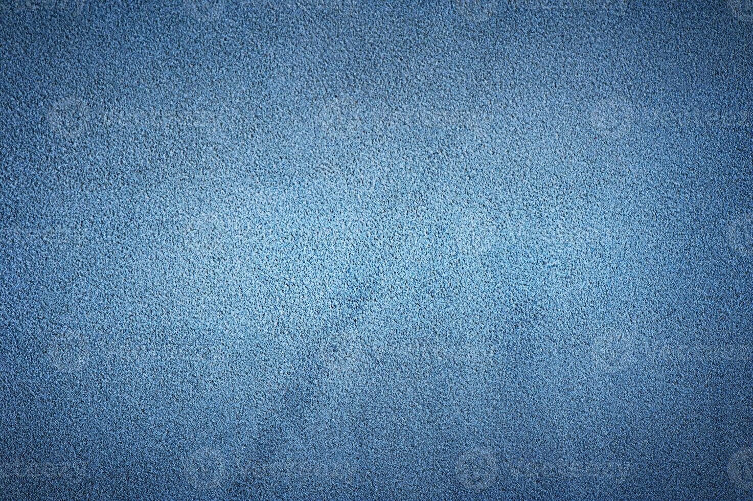 Blue suede genuine leather as a background macro photo. photo
