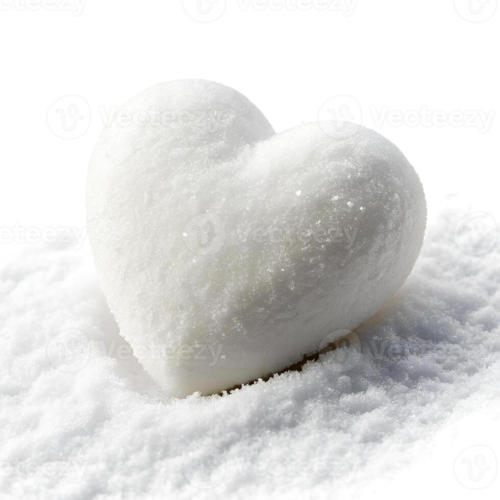 a heart-shaped snowball sitting on a bed of snow photo