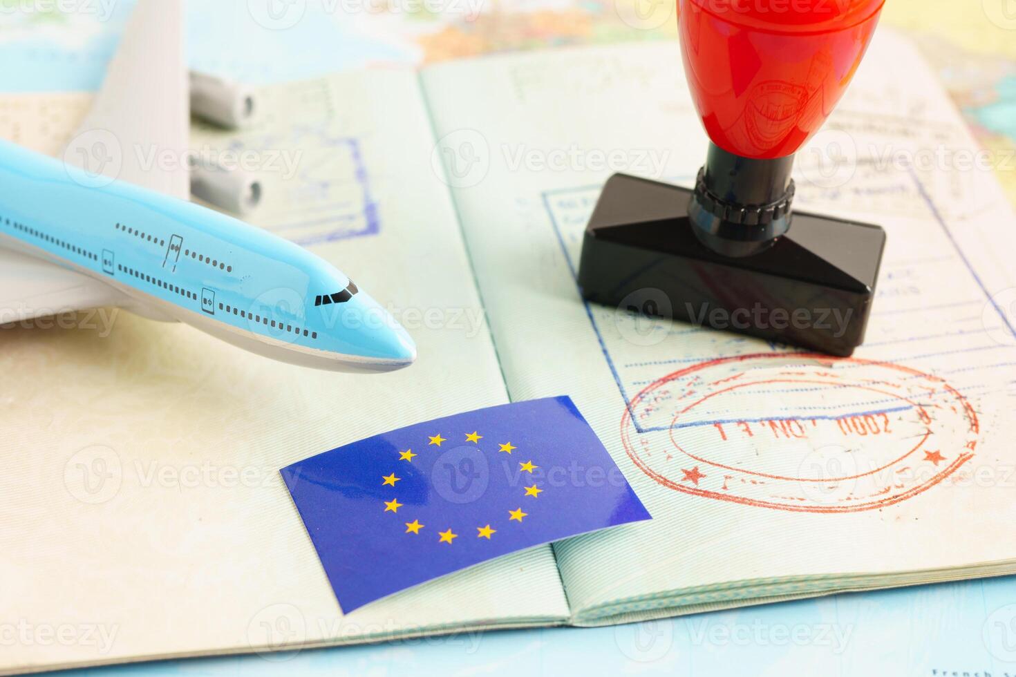 EU passport with approved stamp on document for tourism to immigration at airport in country. photo
