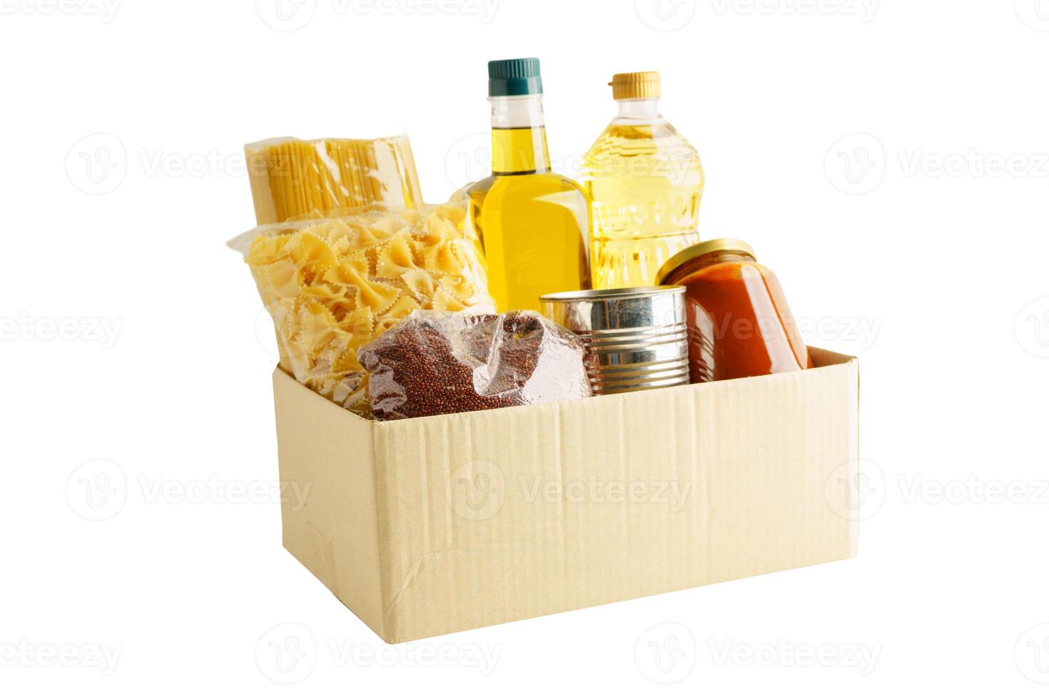 Foodstuffs in donation box isolated on white background for volunteer to help photo