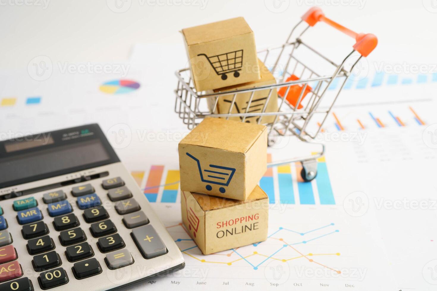 Online shopping, Shopping cart box on business graph, import export, finance photo