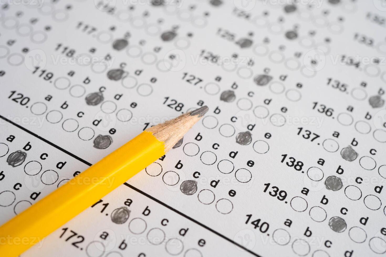 Answer sheets with pencil drawing fill to select choice, photo