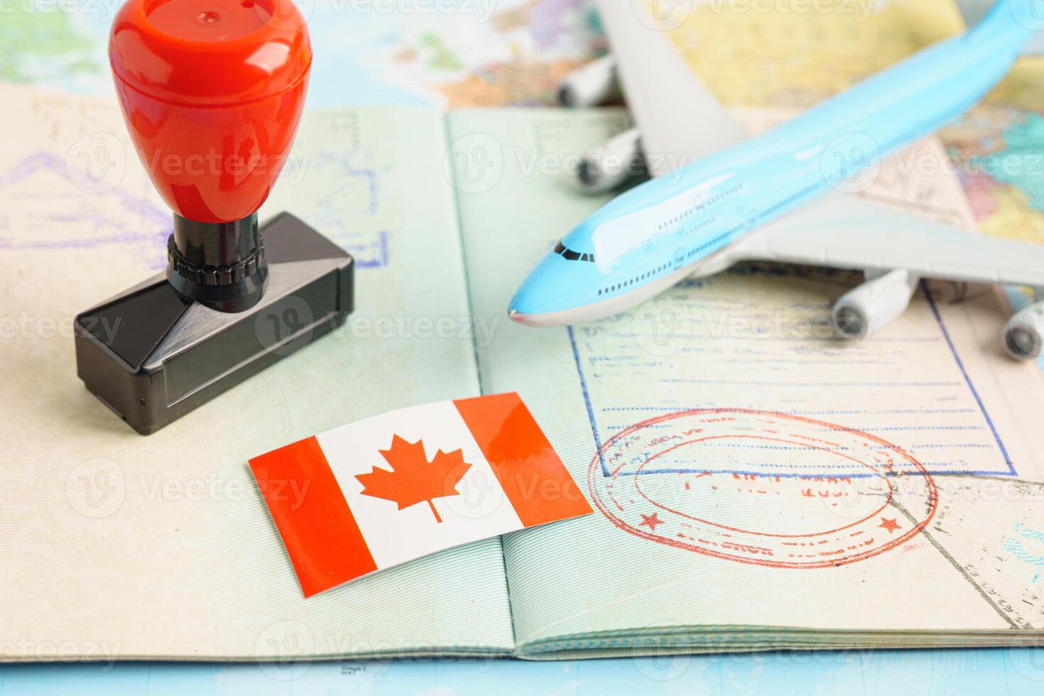 Canada passport with approved stamp on document for tourism to immigration at airport in country. photo