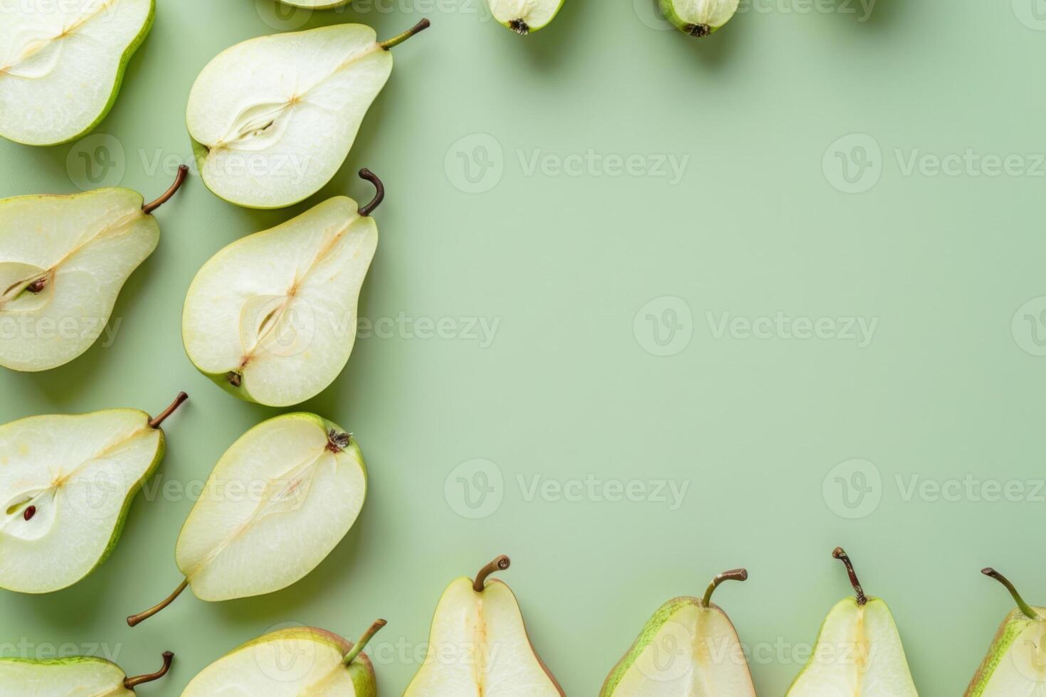 Pear slices on a soft green backdrop photo