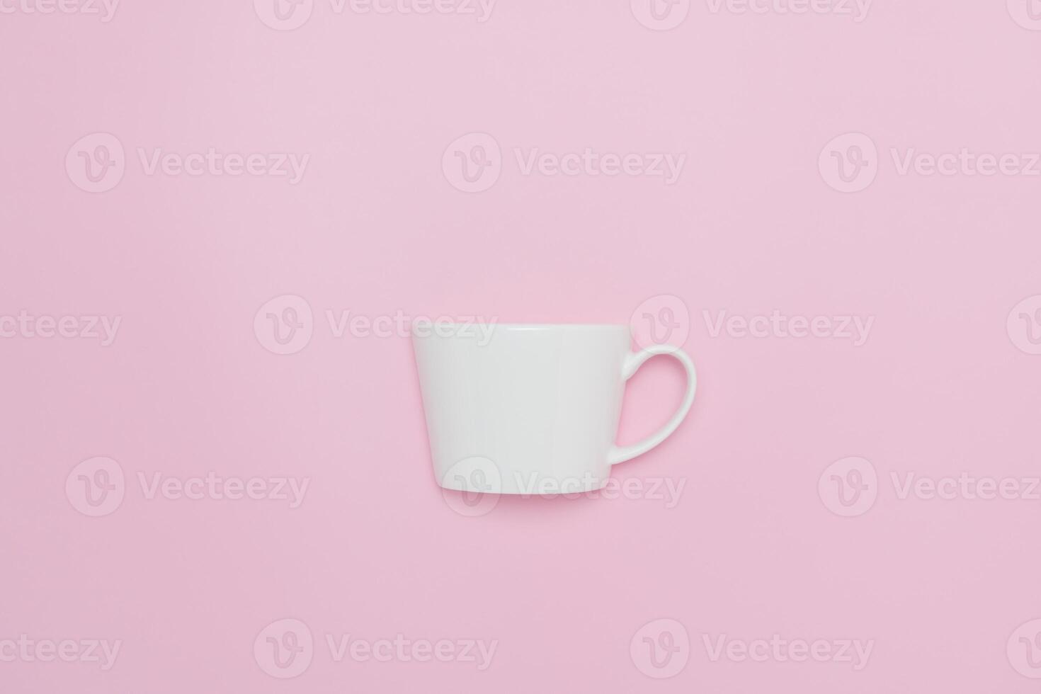 Creative minimalist composition of a white coffee cup set against a pink background, symbolizing love and warmth. photo