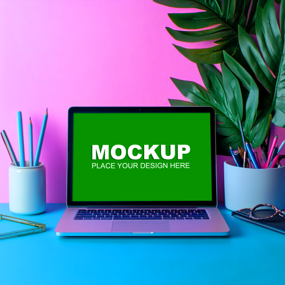 laptop mockup on a colorful desk psd