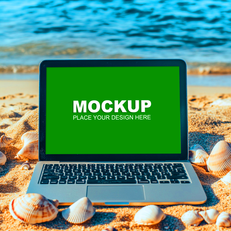 laptop on the beach with seashells and a laptop mockup psd