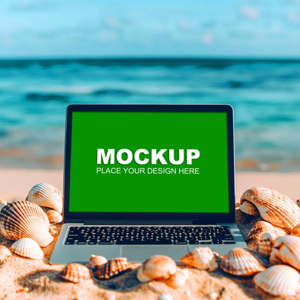 laptop on the beach with seashells and a green screen mockup psd
