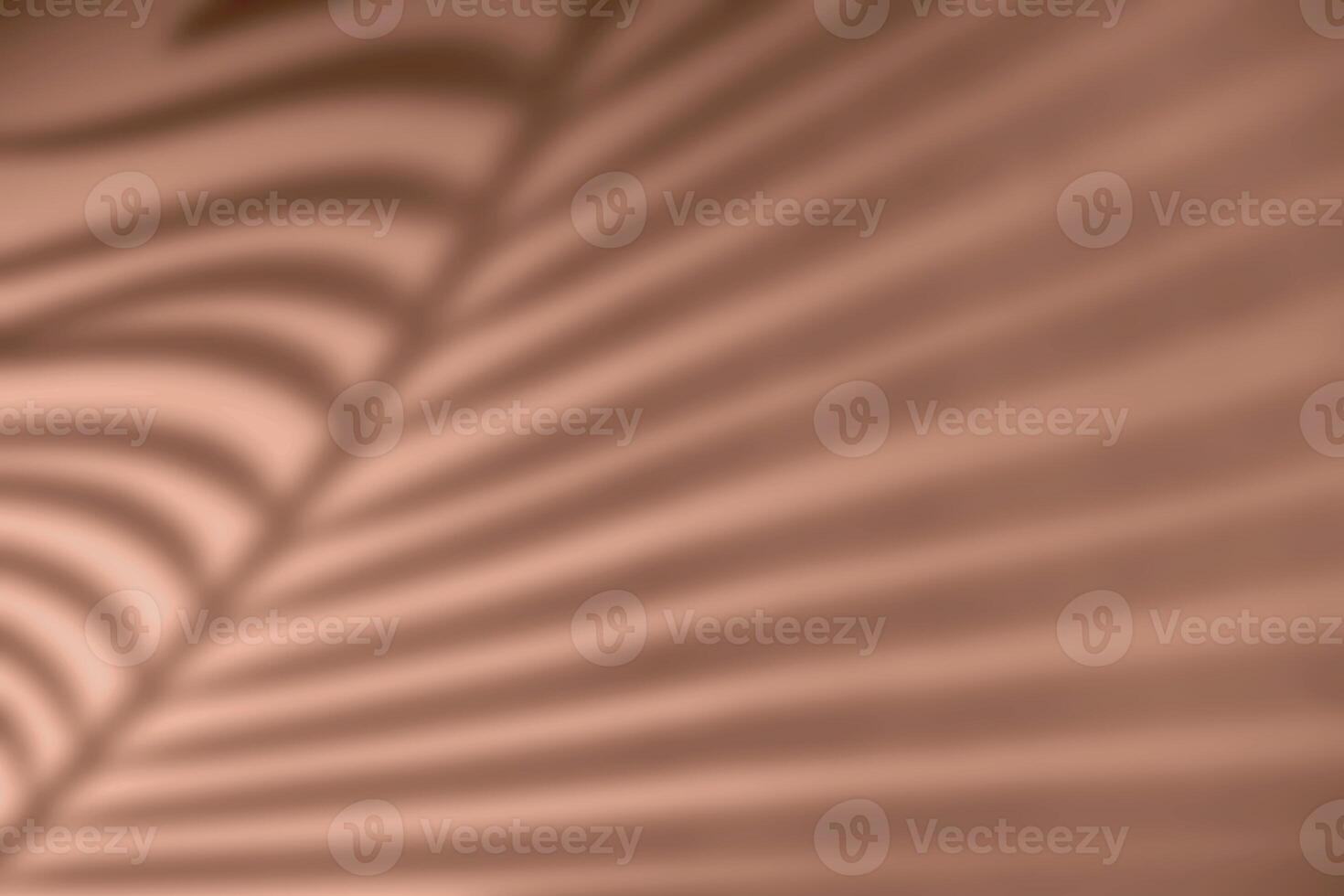Shadow of palm leaf on natural earthy mocha mousse color background photo