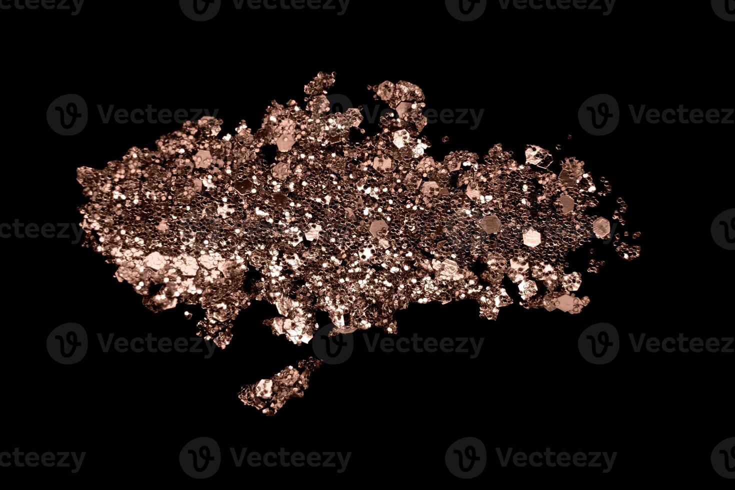 mocha mousse glitter makeup product smear on black. Eye shadow, lip gloss and holiday makeup swatch photo