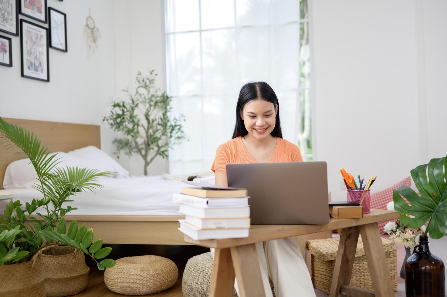 a University woman doing homework . photo