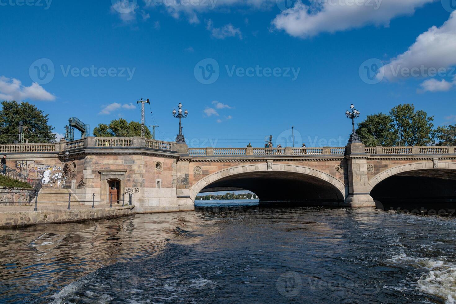 A bridge over a river in the city of hamburg photo