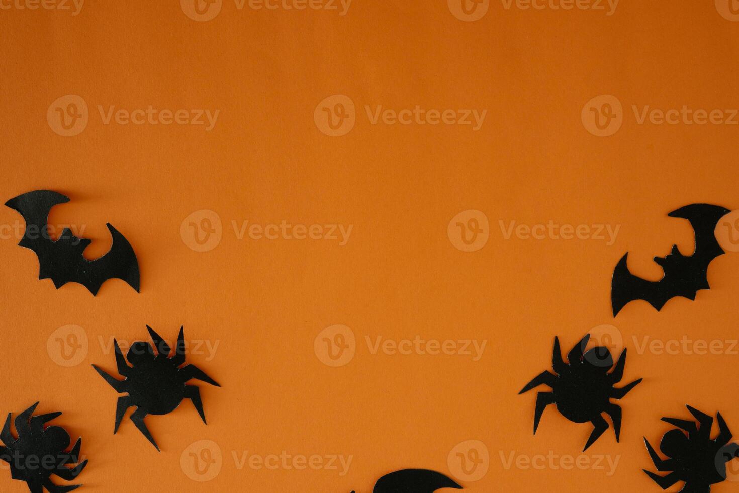 bat and spider paper cut out for copy space background photo