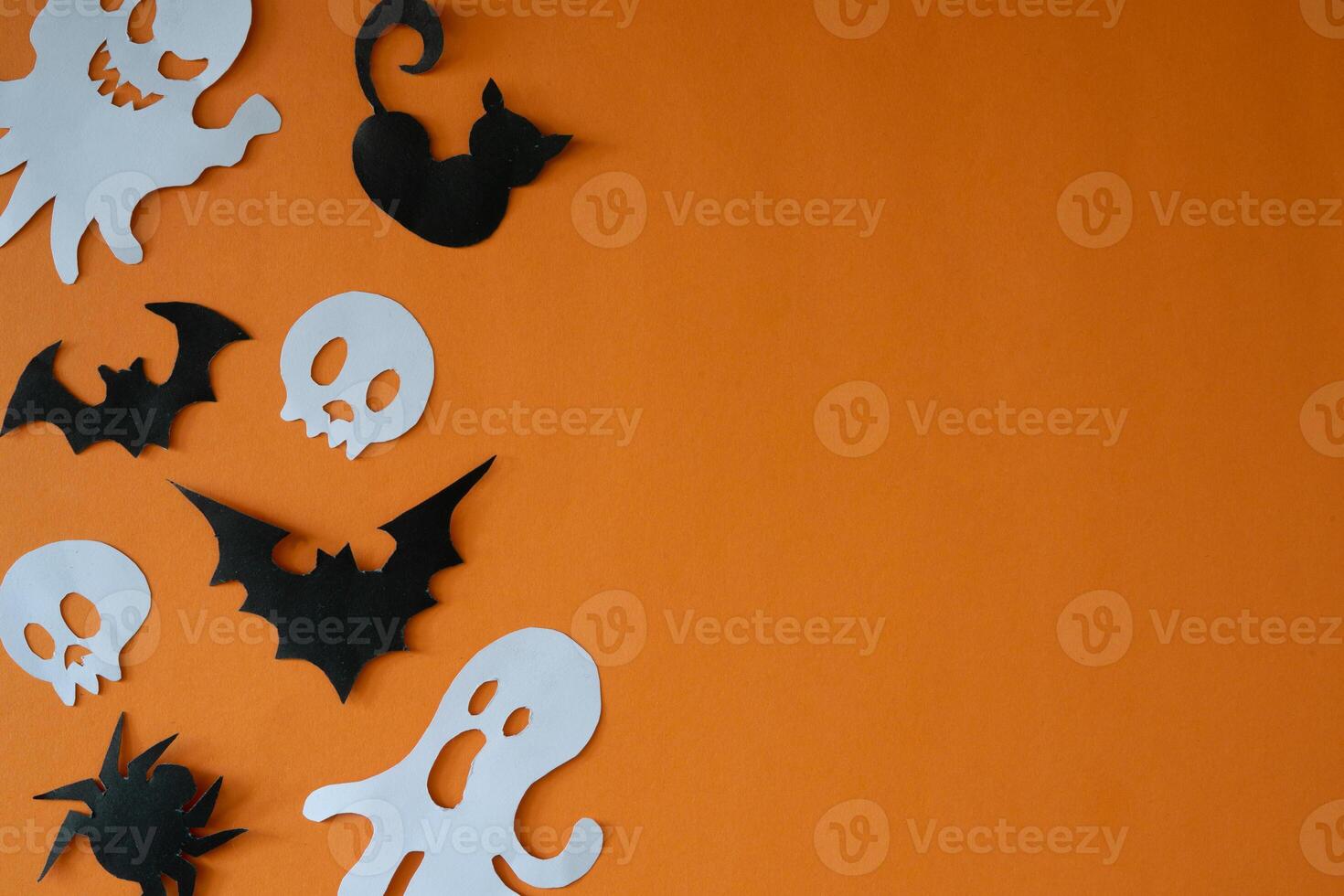 Skull and ghost ornament for copy space backdrop photo