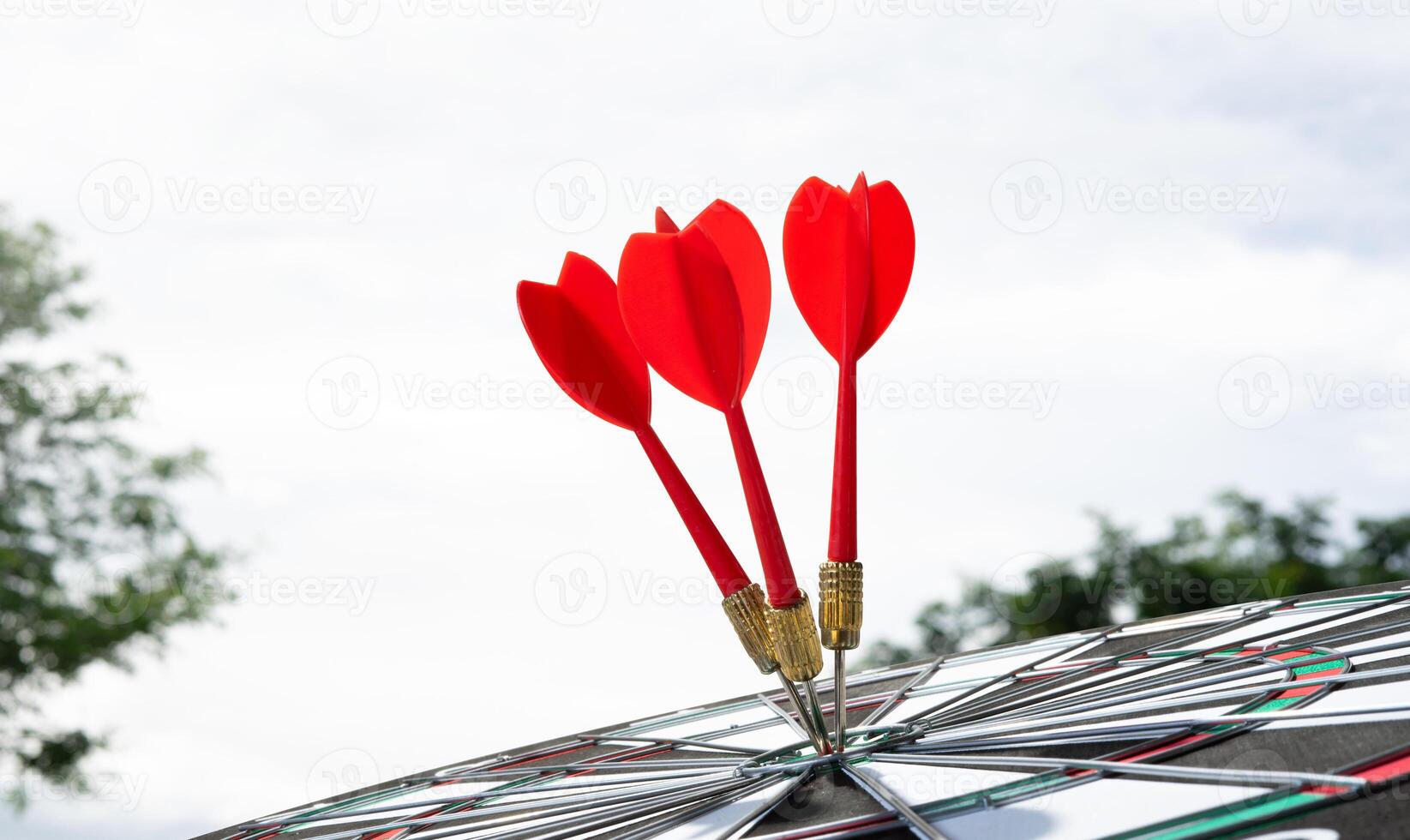 red arrows on target with sky background photo