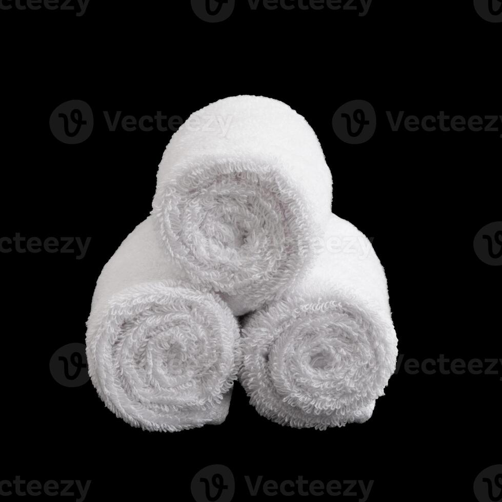 stack of white face towel rolls photo