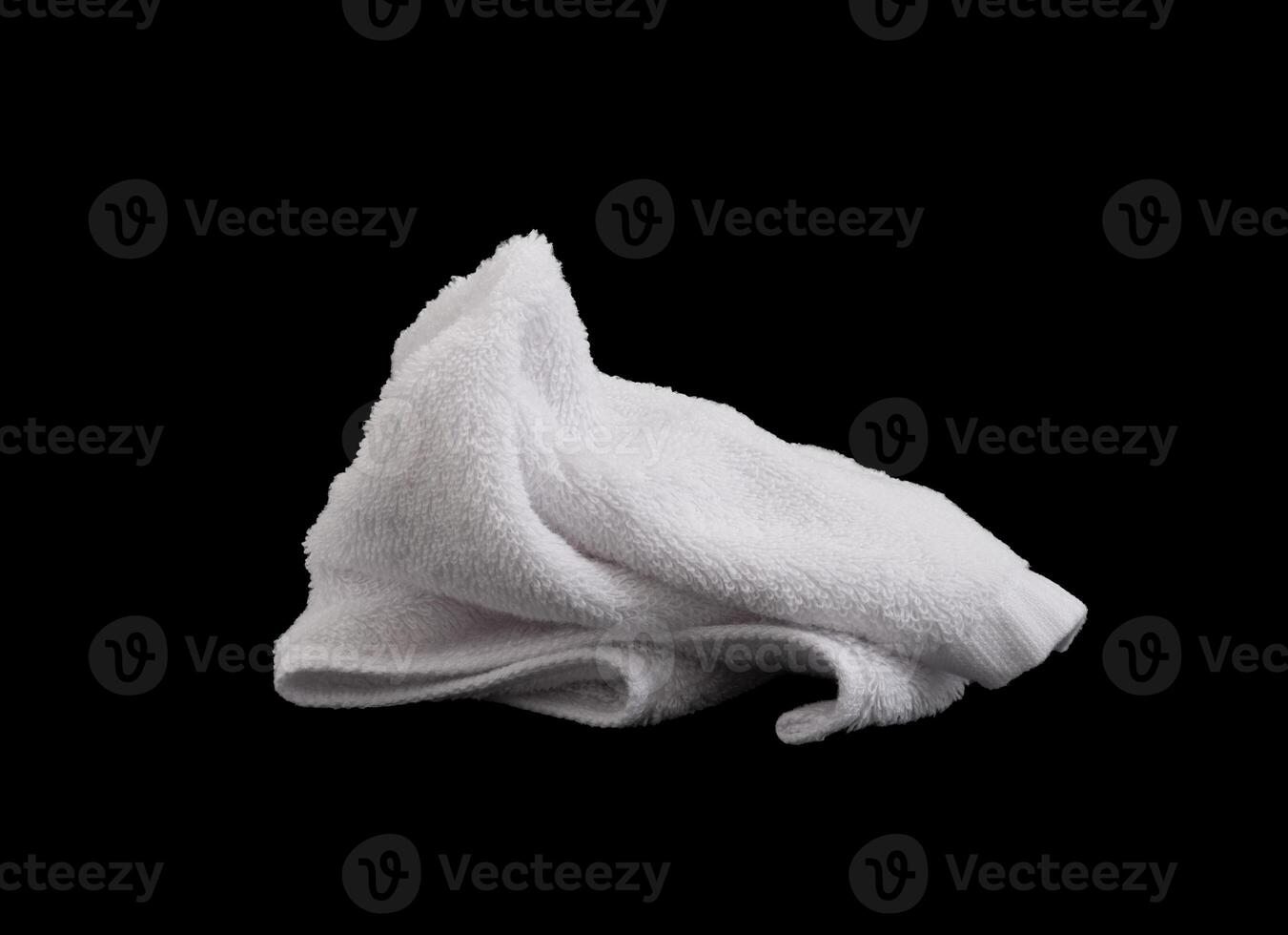 messy white hand towel isolated photo