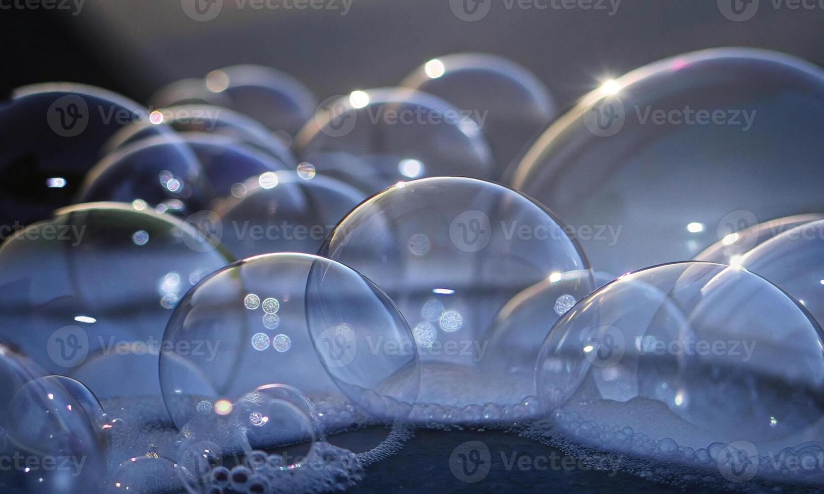 Transparent soap bubbles. harmony of color, shape and fragility photo
