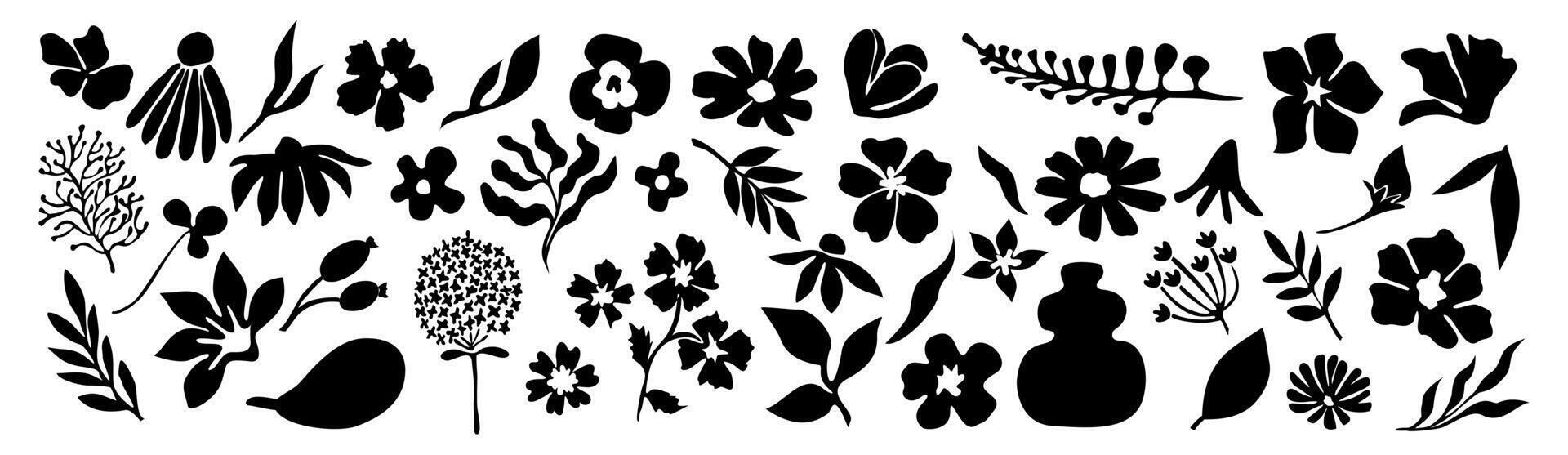 A set of silhouettes of flowers and leaves vector