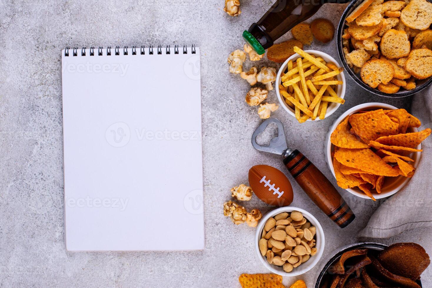 Beer and different snacks for Superbowl or football party photo