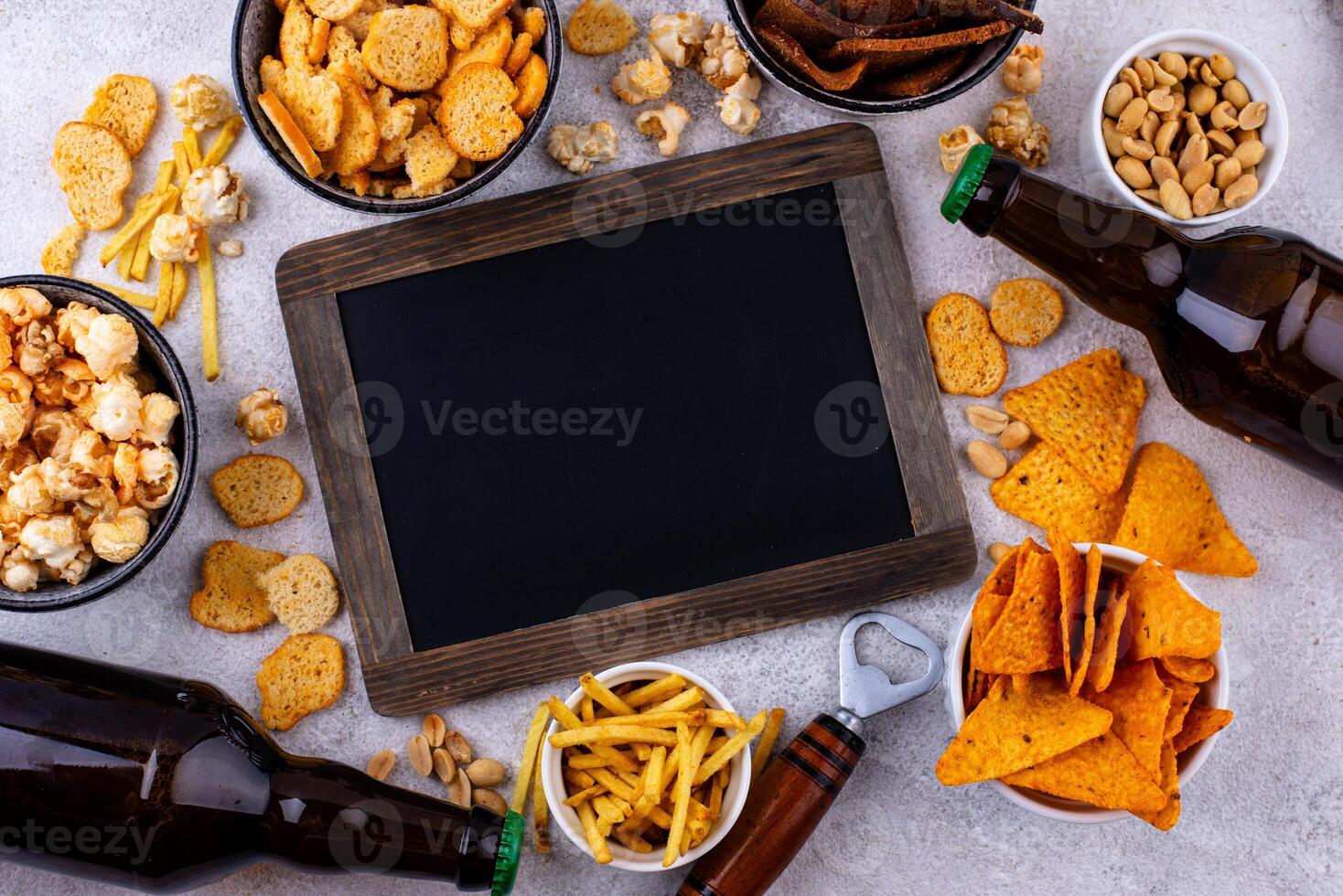 Beer and different snacks for Superbowl or football party photo