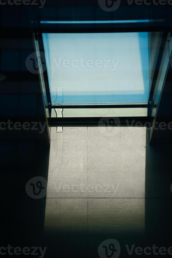 A window with a view of the ocean photo