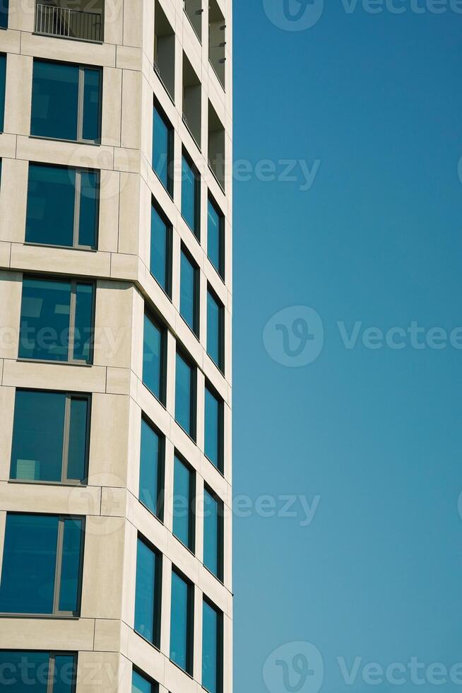 A tall building with a clock on it photo