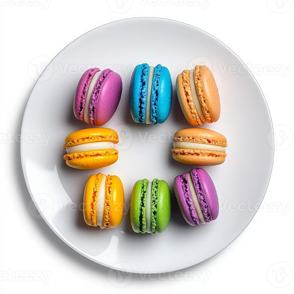 Colorful macarons on a white plate photo