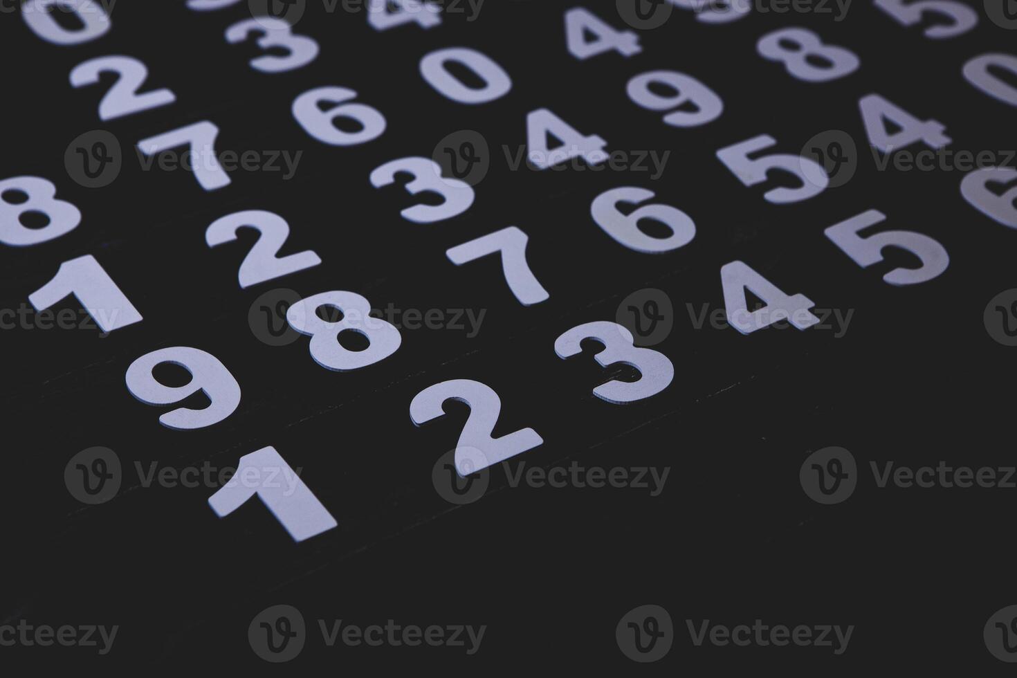 Close up of numbers on a blackboard. Toned image. photo