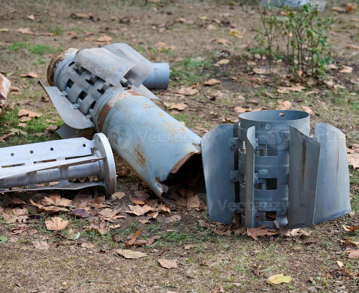 The tail section of a 220 mm rocket for the Uragan rocket fire system on a city flowerbed in Mykolaiv. photo
