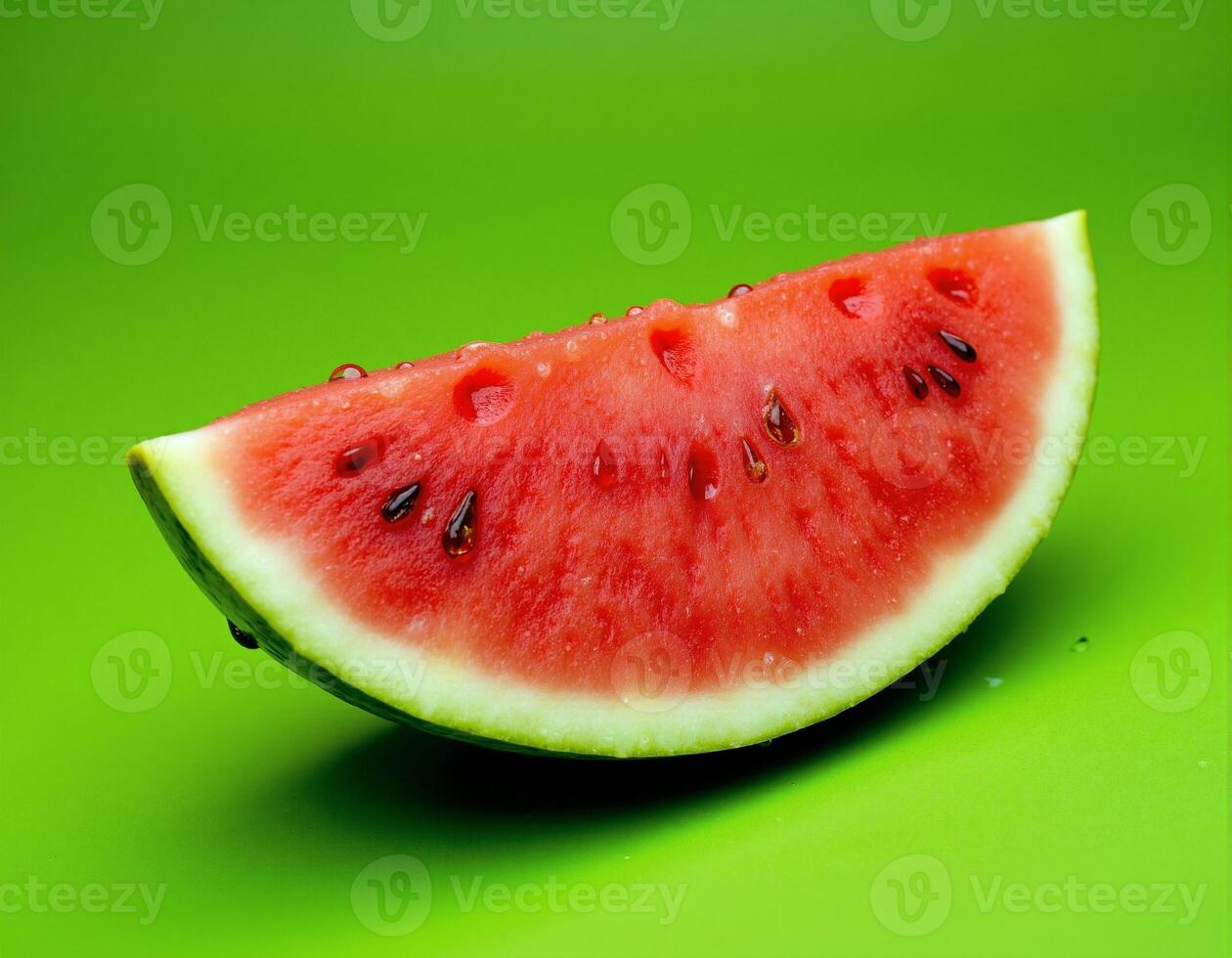 Watermelon Slice on Green Background photo
