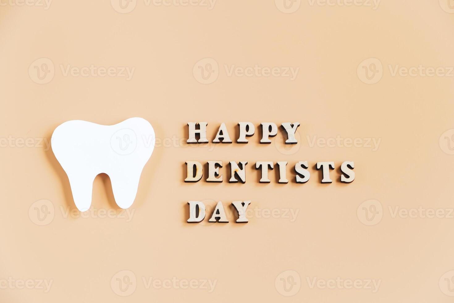 International Dentist Day. Eco-friendly wooden toothbrushes on beige background. Dental care concept photo