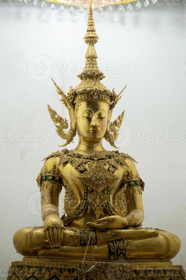 The mock-up of Phra Fang Buddha statue in Wat Phra Fang temple in Uttaradit province of Thailand. The real statue is currently preserved at Wat Benchamabophit, Bangkok. photo