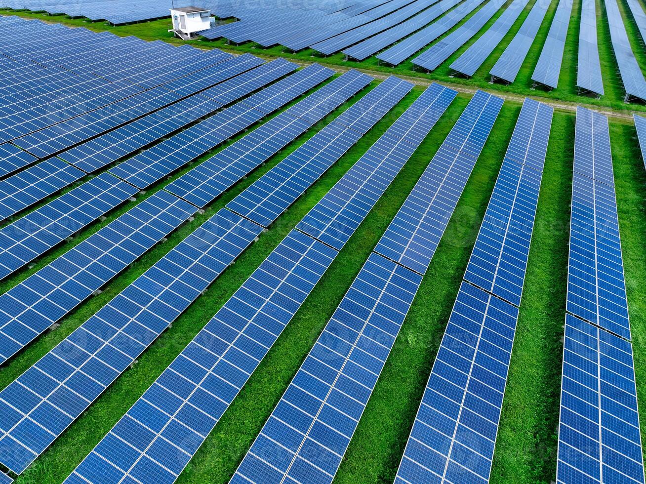 Aerial view solar farm. Sustainable renewable energy and modern photovoltaic technology for eco-friendly electricity production. Solar power station. Green energy solutions. Solar panel technology. photo