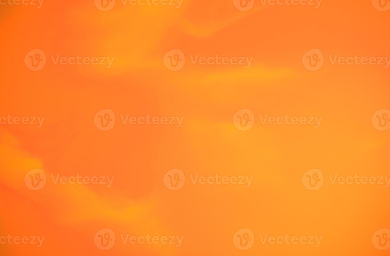 Vibrant orange sunset sky create a serene and tranquil atmosphere, ideal for climate and environmental concepts or as an emotional and psychological design background, evoking warmth and creativity. photo