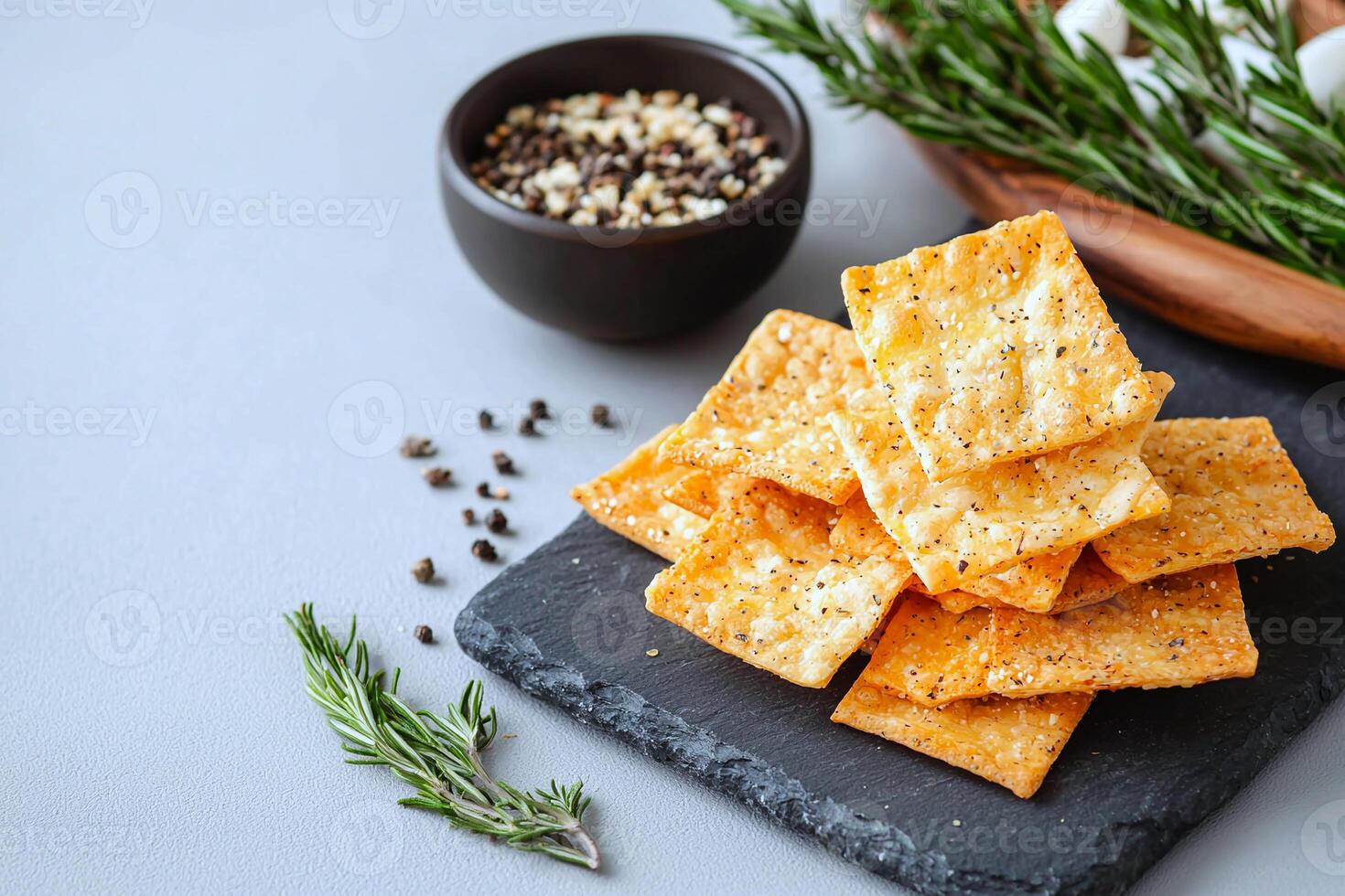 Minimalist slate board with keto friendly cheese crisps, perfect for targeted diet snack promotions photo