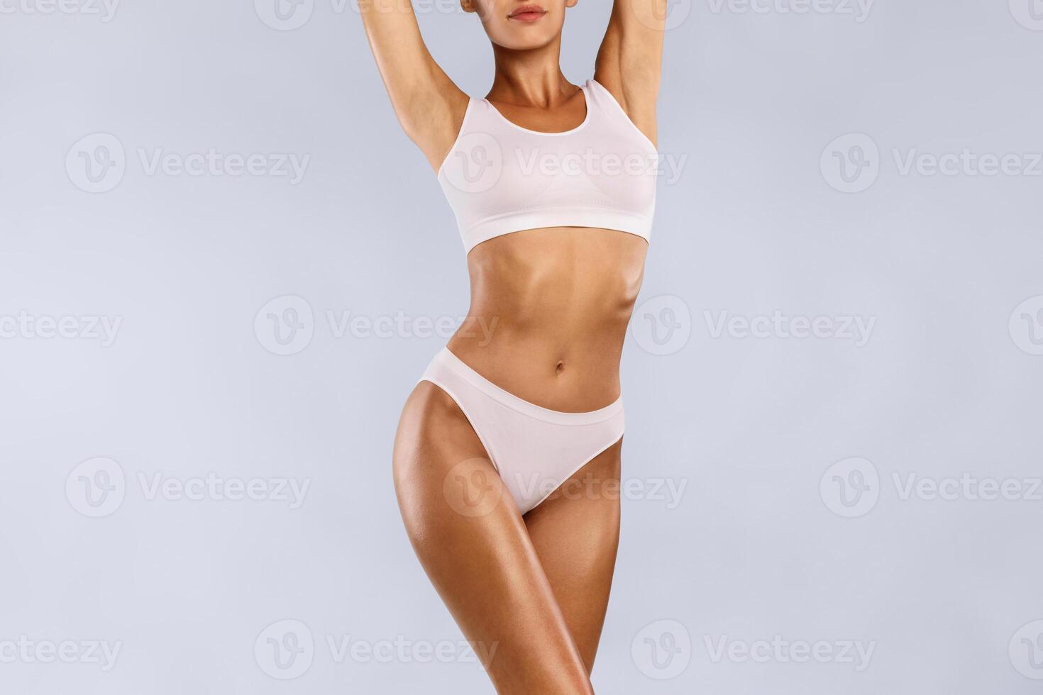 Love Yourself, Body Neutrality. Positive Slim Lady With Perfect Ideal Shape And Appearance Posing Isolated On Blue Studio Background, Lady In White Underwear Enjoying Herself, Free Copy Space, Banner photo