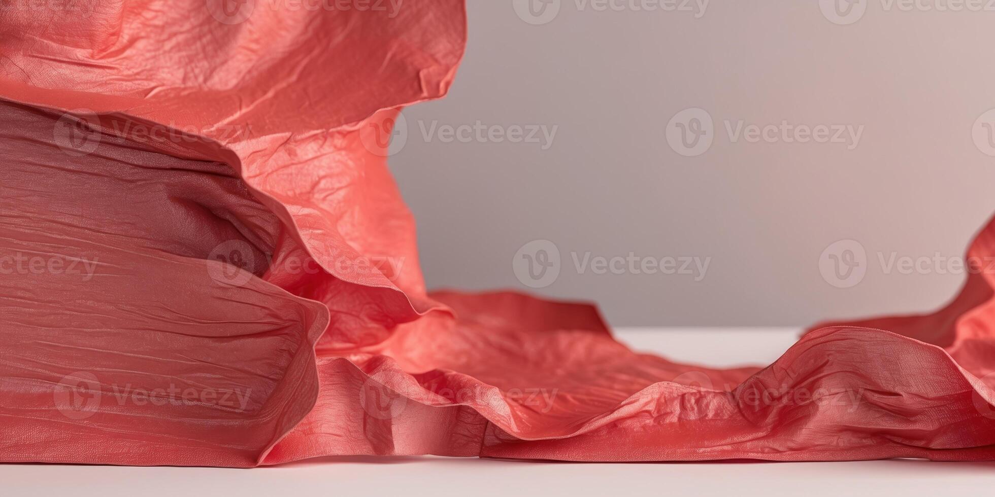 A Textured Red Surface with Soft Gradient Light and Crinkled Edges creating Depth. photo