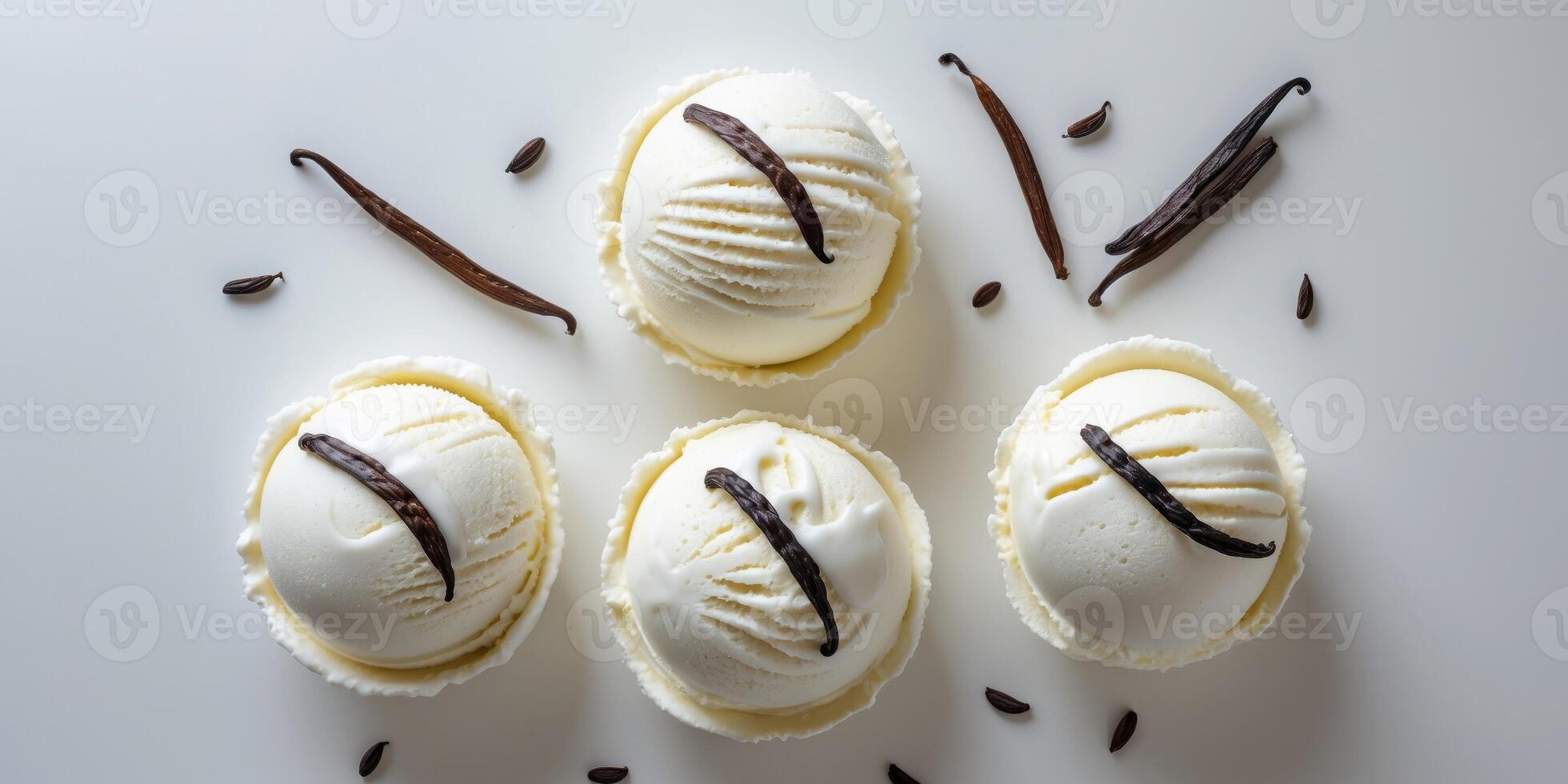 Three vanilla ice cream scoops with vanilla beans on top photo