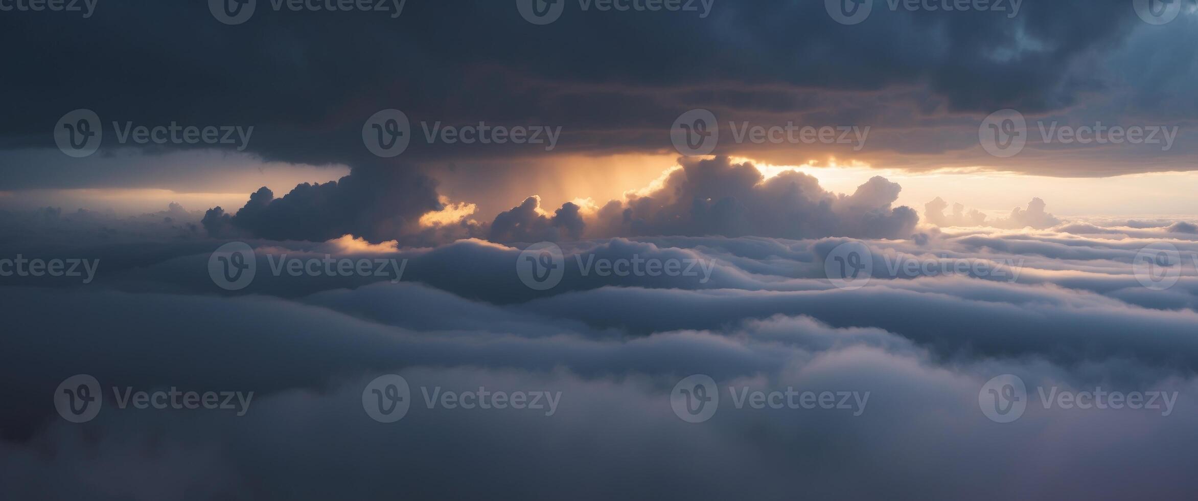 Dramatic Cloudscape with Golden Glow and Dark Shadows. photo