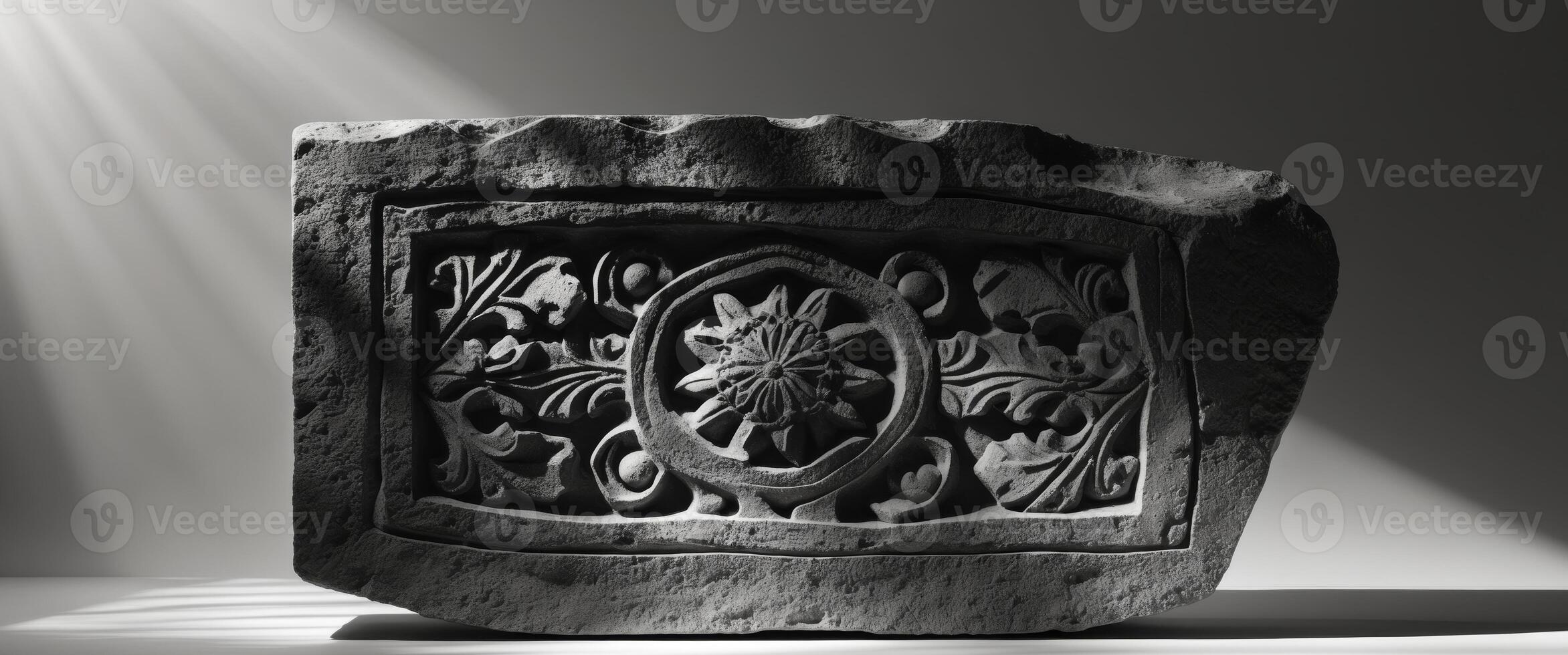 Intricate Carved Stone Slab - Dramatic Lighting. photo