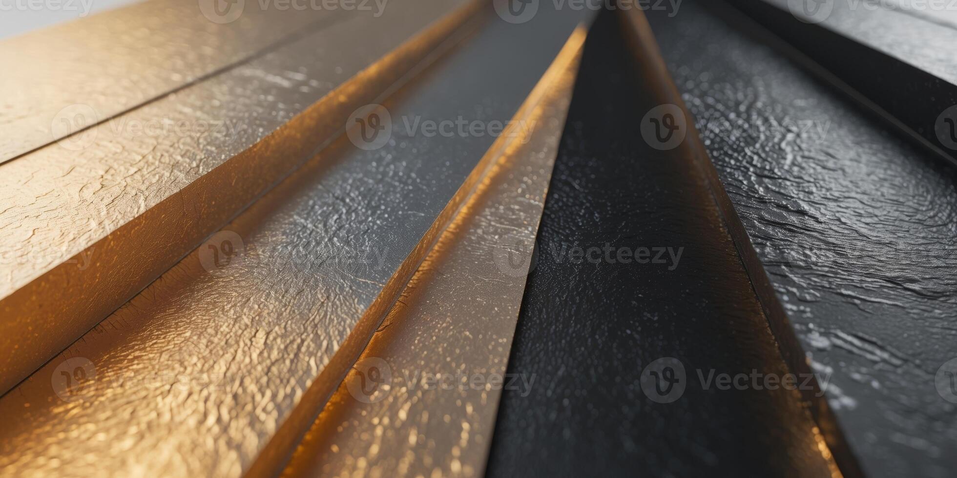 Textured metallic background showing a gradient of colors from black to gold. photo