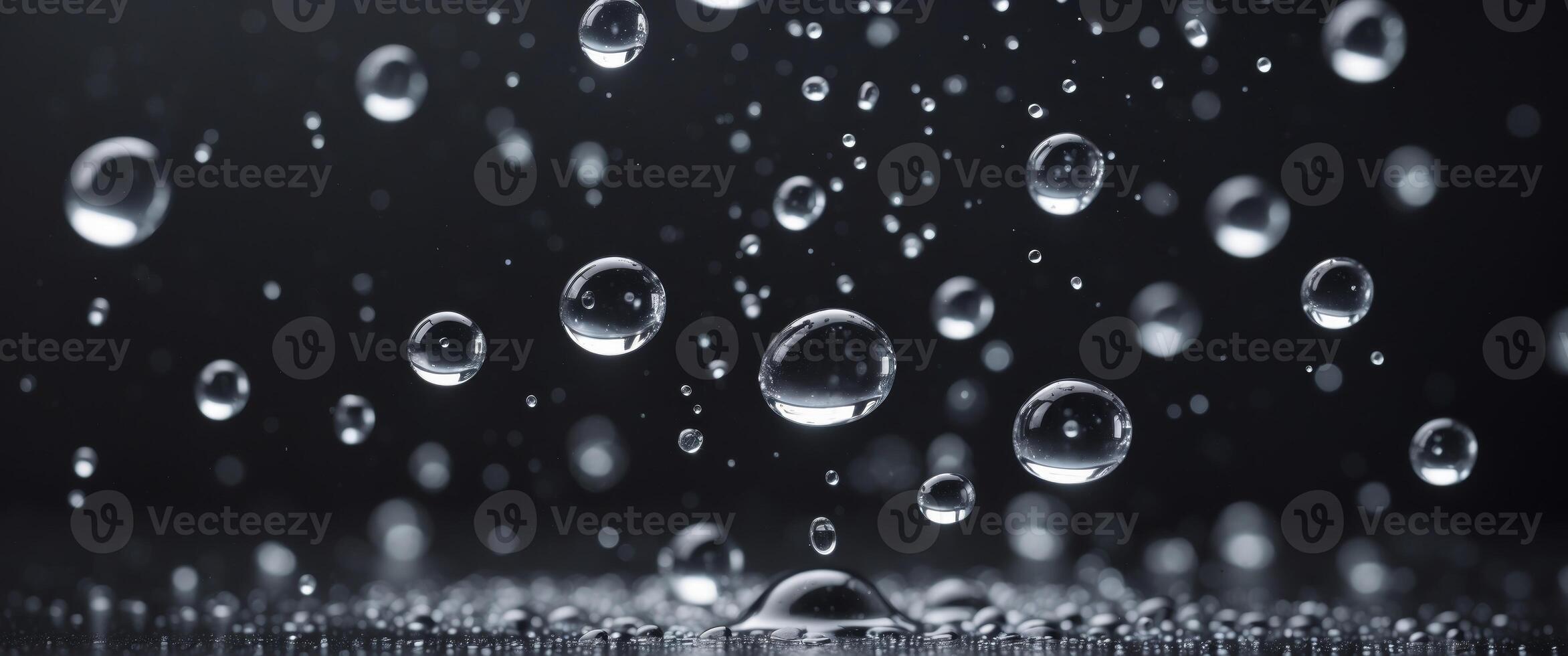 close up of water drops on black background. photo