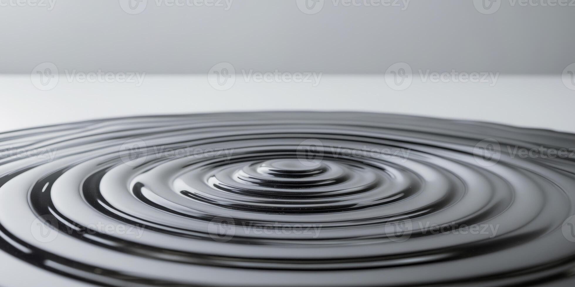 Dark Liquid Surface Showing Concentric Ripples photo