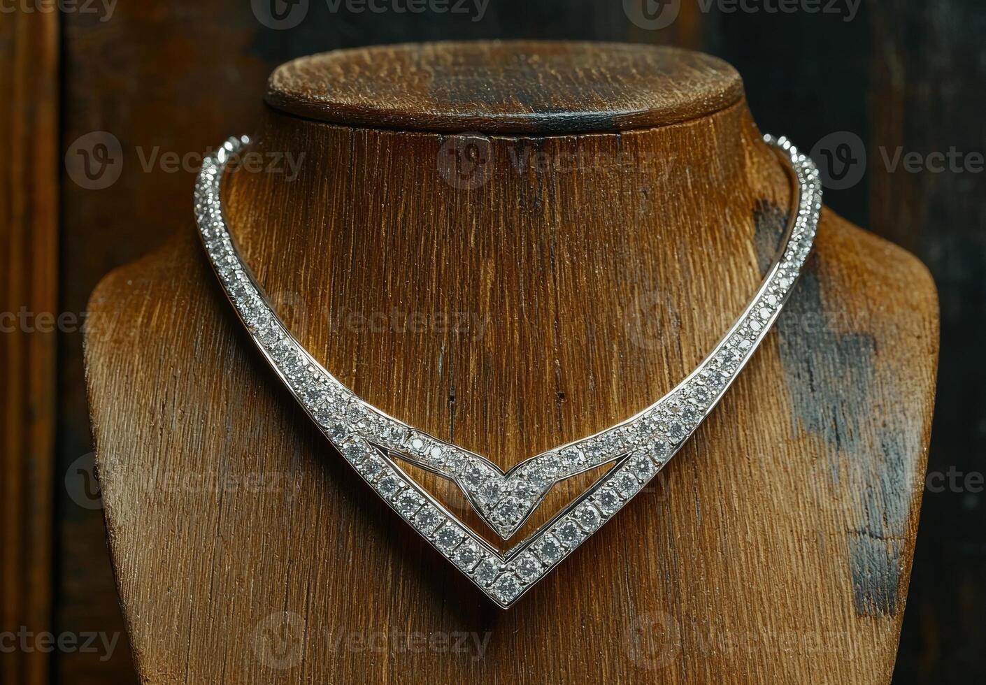 Elegant diamond necklace on wooden display photo