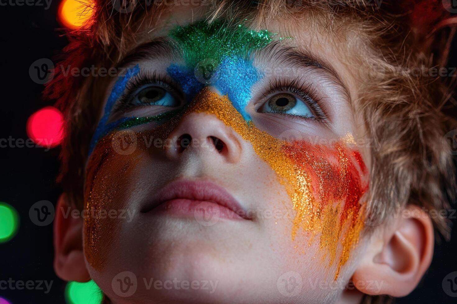 Close up portrait of a child with colorful glitter makeup photo