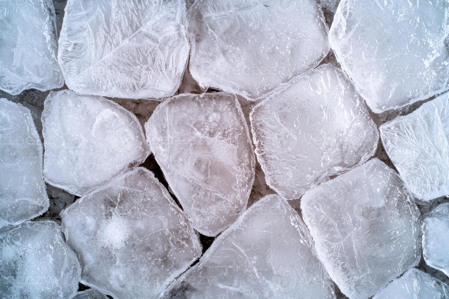 Close up of many ice cubes forming a textured background photo